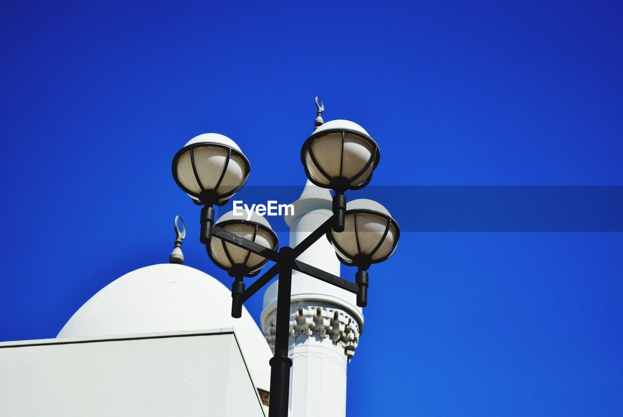 LOW ANGLE VIEW OF STREET LIGHT AGAINST SKY