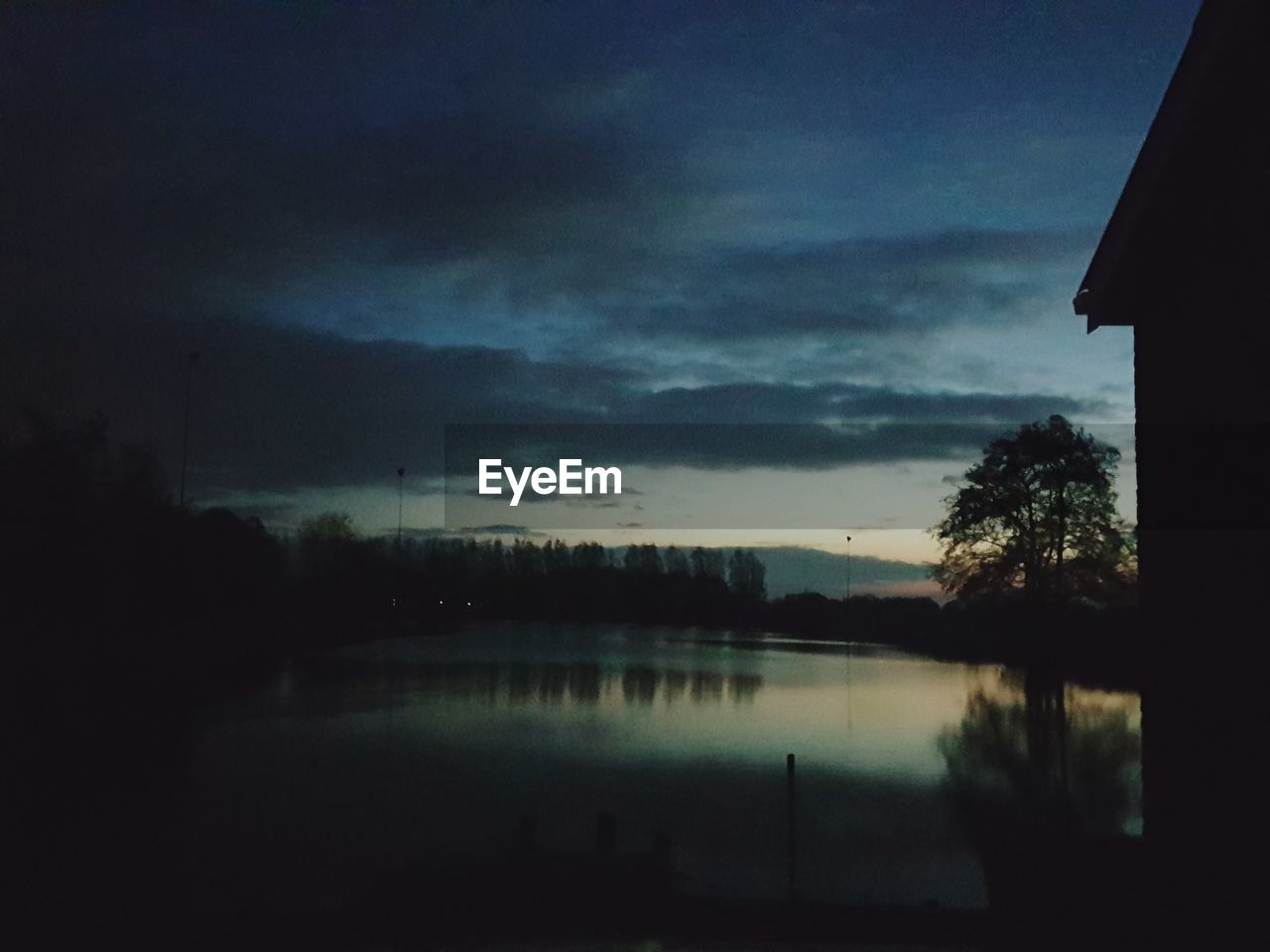 SCENIC VIEW OF SILHOUETTE LANDSCAPE AGAINST SKY AT NIGHT