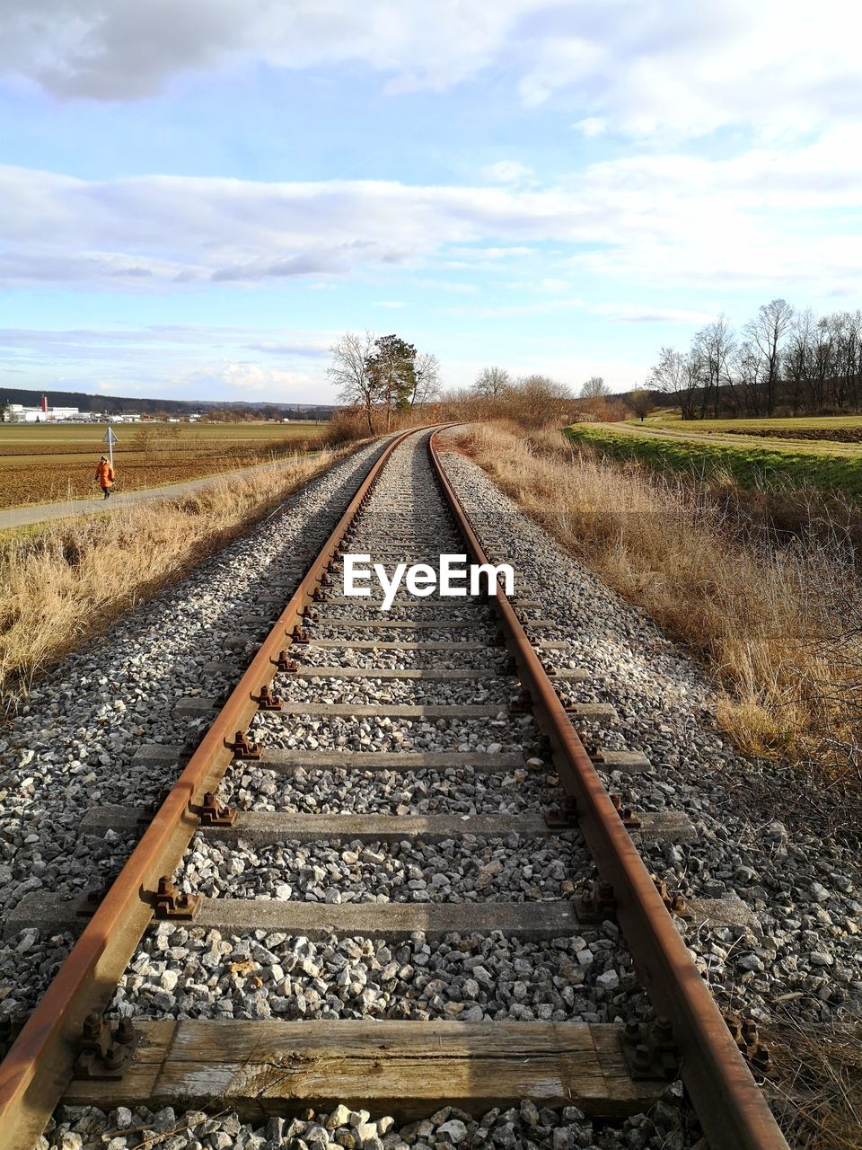 VIEW OF RAILROAD TRACKS ON LAND