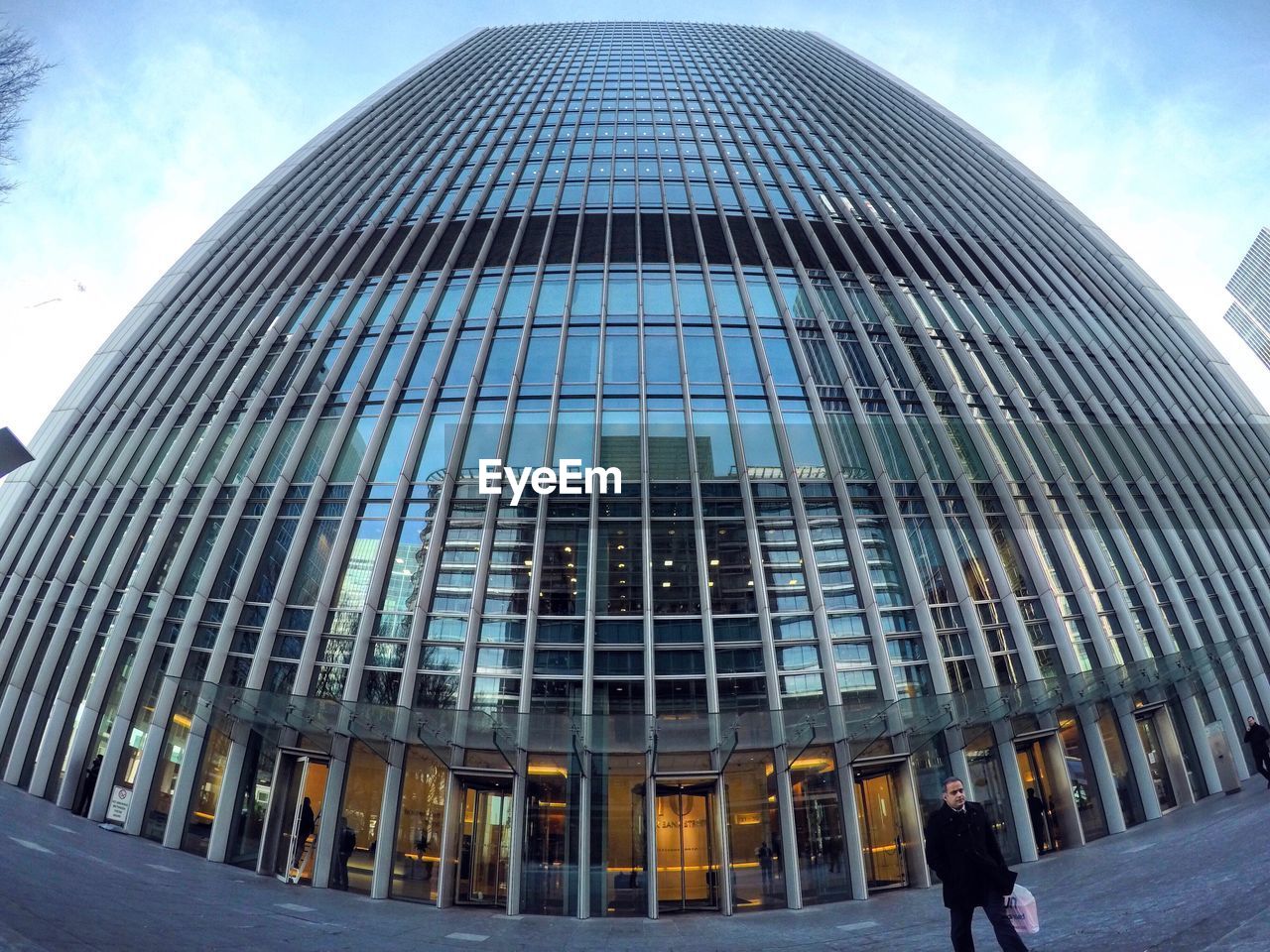 Low angle view of office building against sky