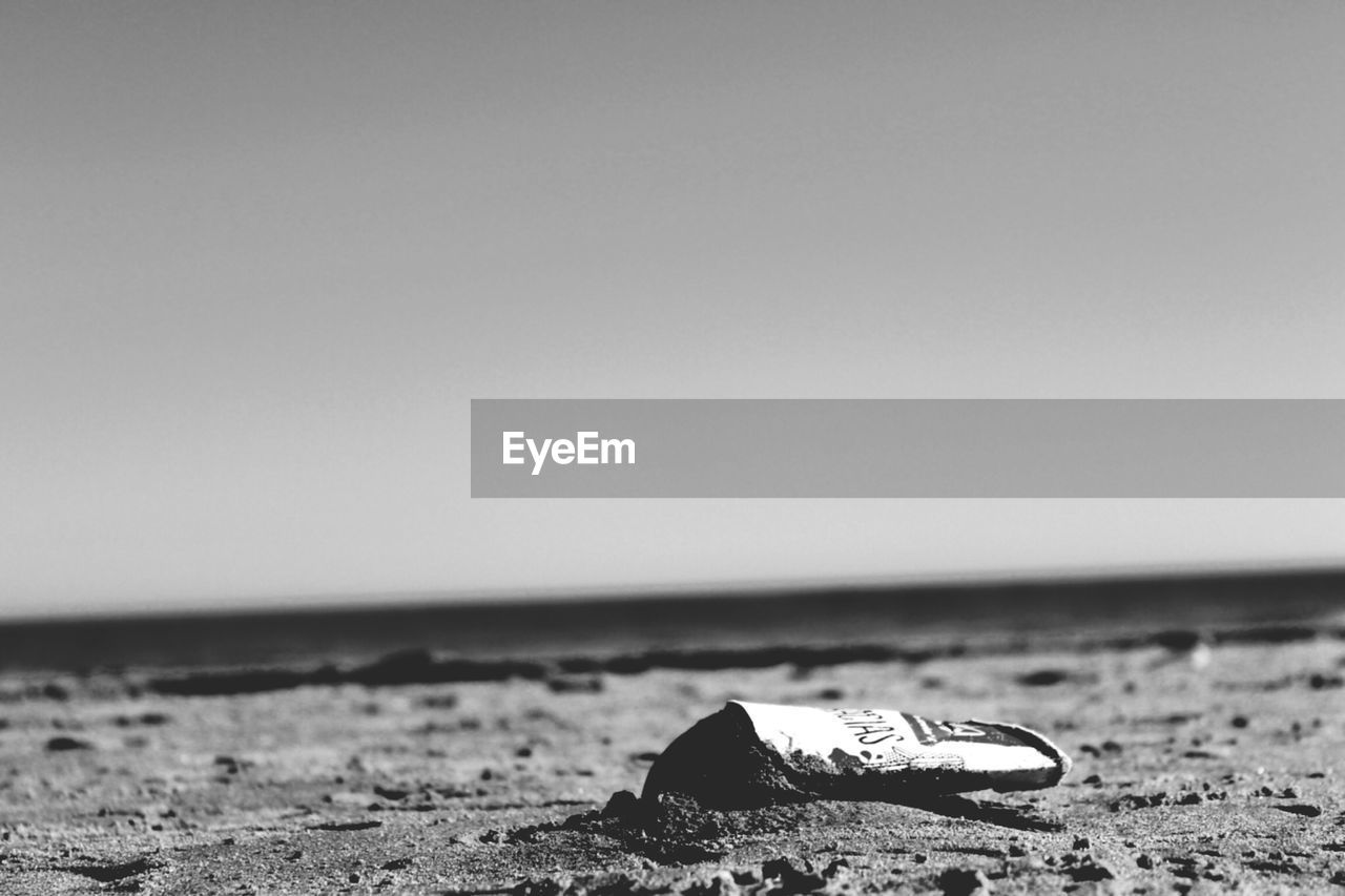 Scenic view of beach against clear sky