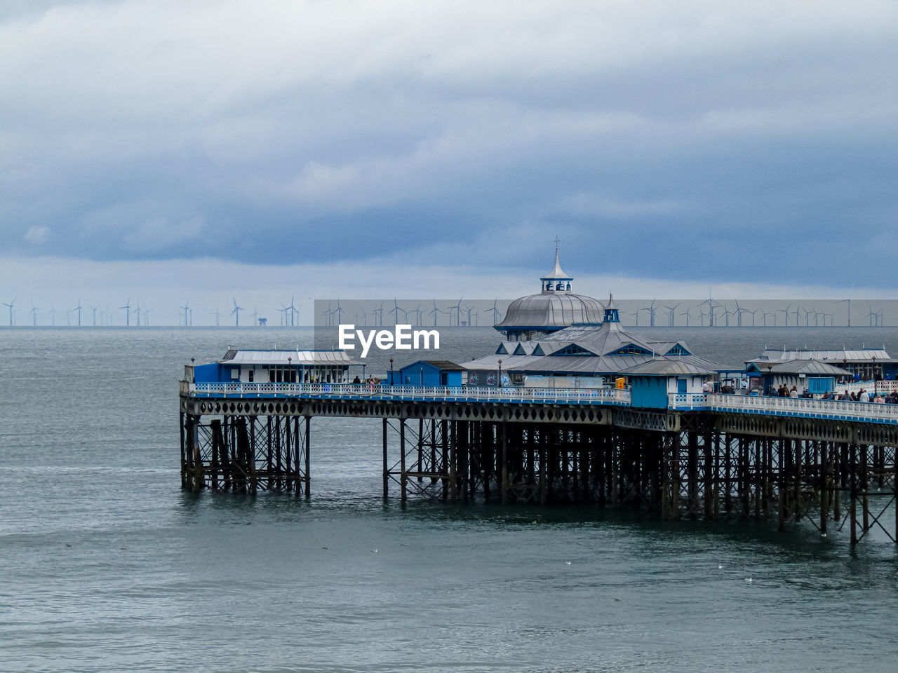 Pier over sea against sky