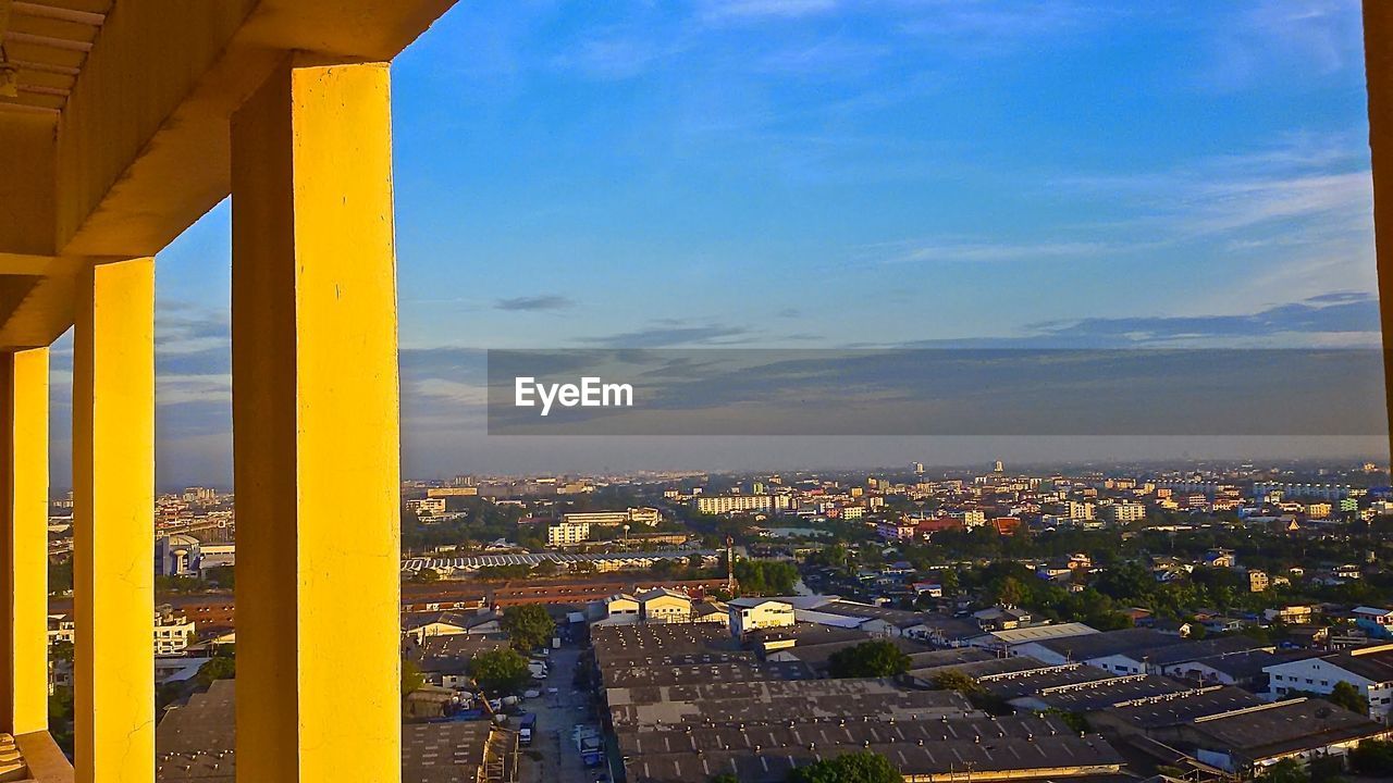 VIEW OF CITYSCAPE AT SUNSET