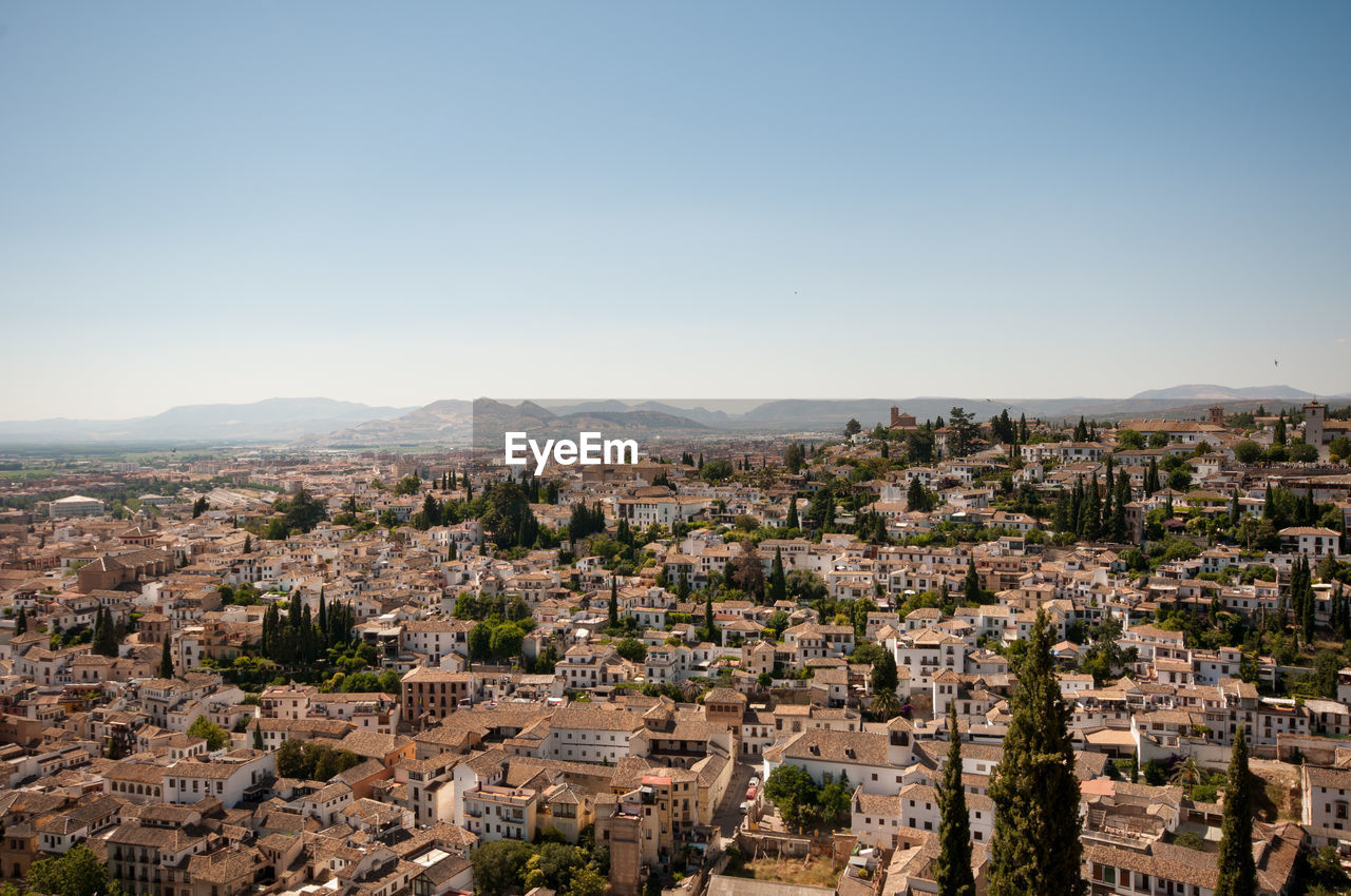 Townscape against clear sky