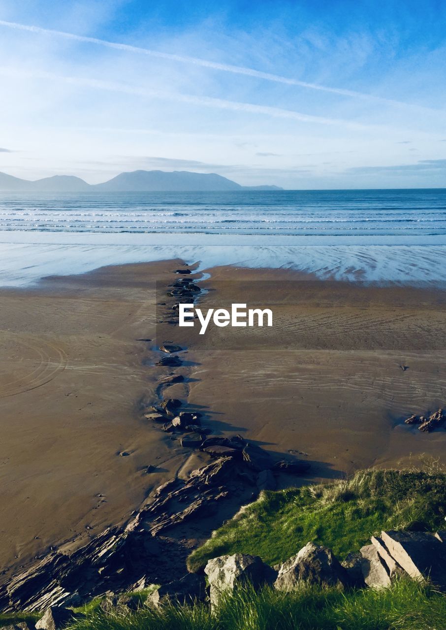 Scenic view of beach against sky