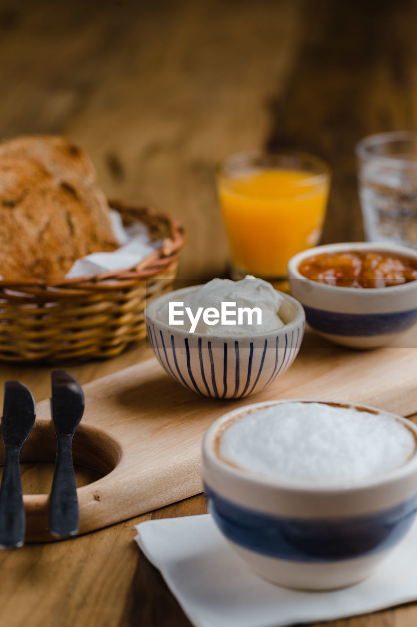 CLOSE-UP OF BREAKFAST AND TABLE