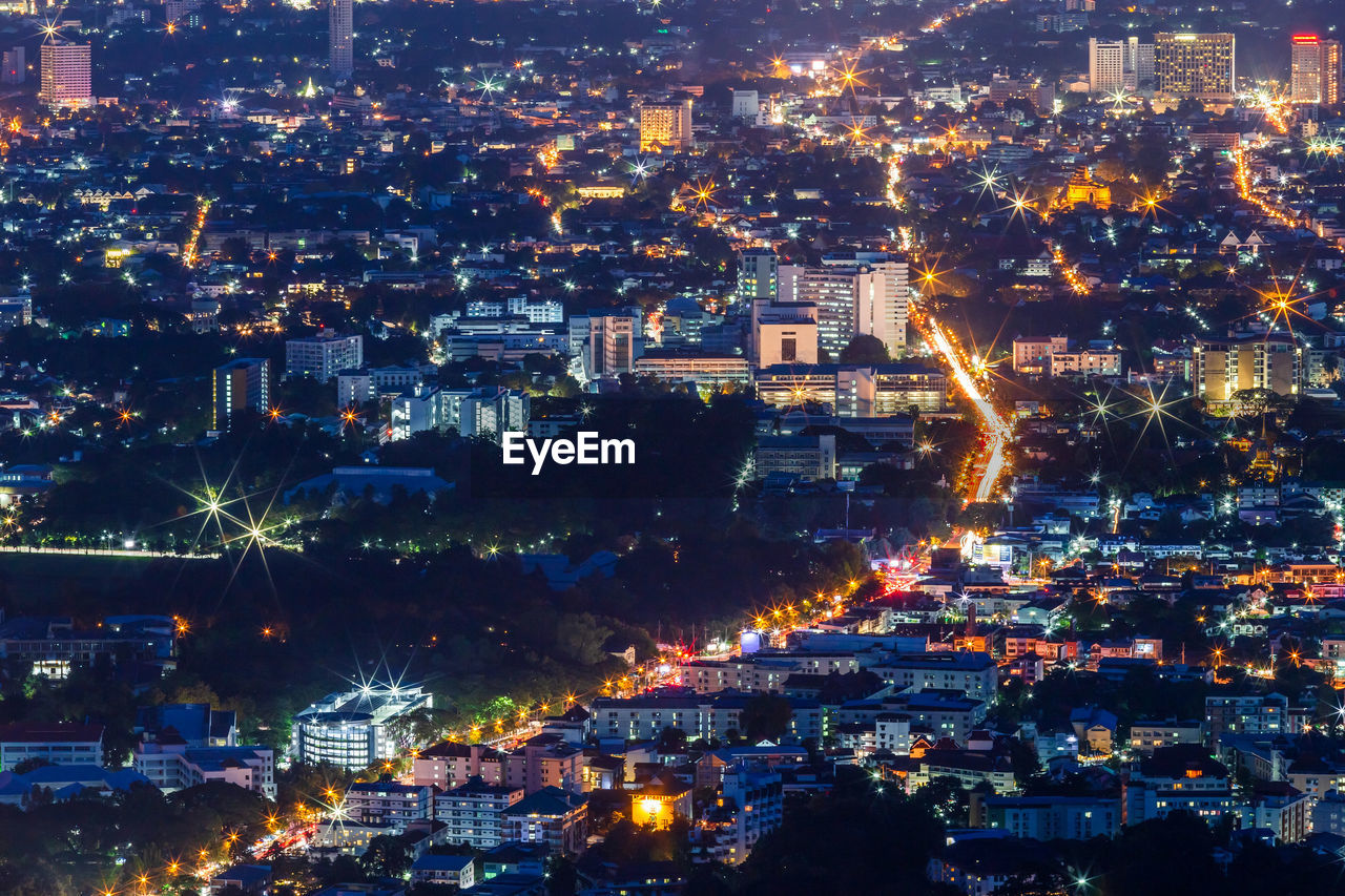 High angle view of illuminated cityscape at night