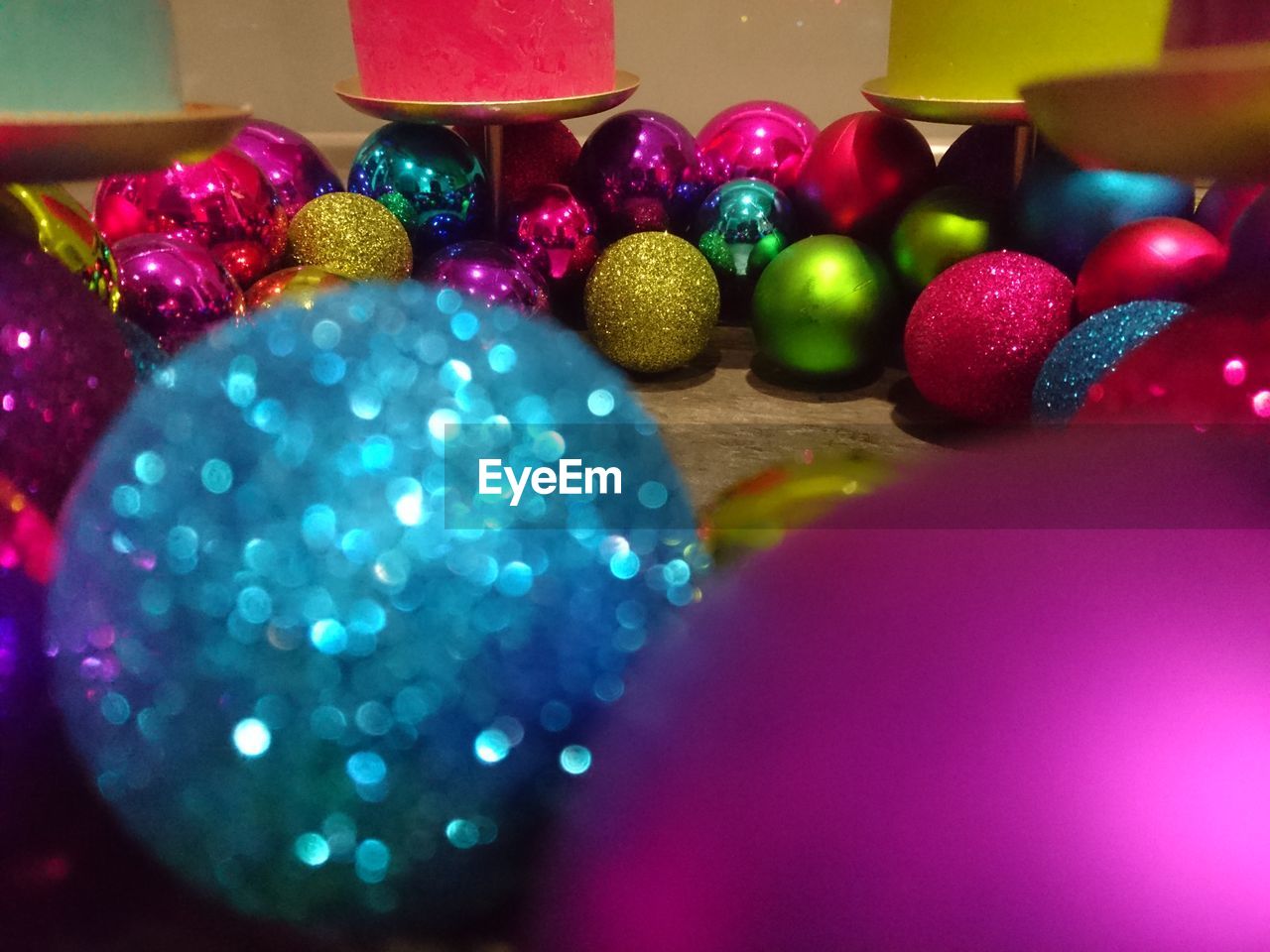 Close-up of colorful baubles on table
