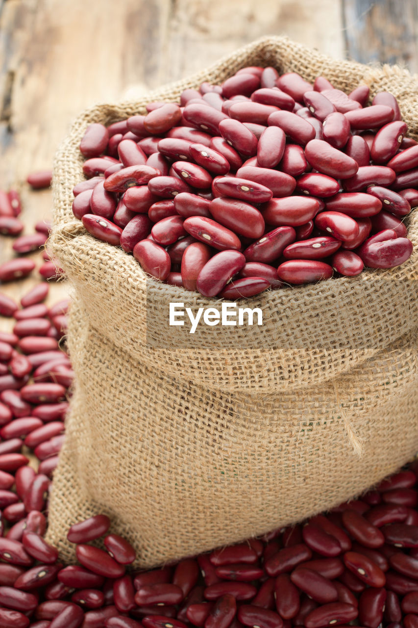 Close-up of kidney beans in sack at market