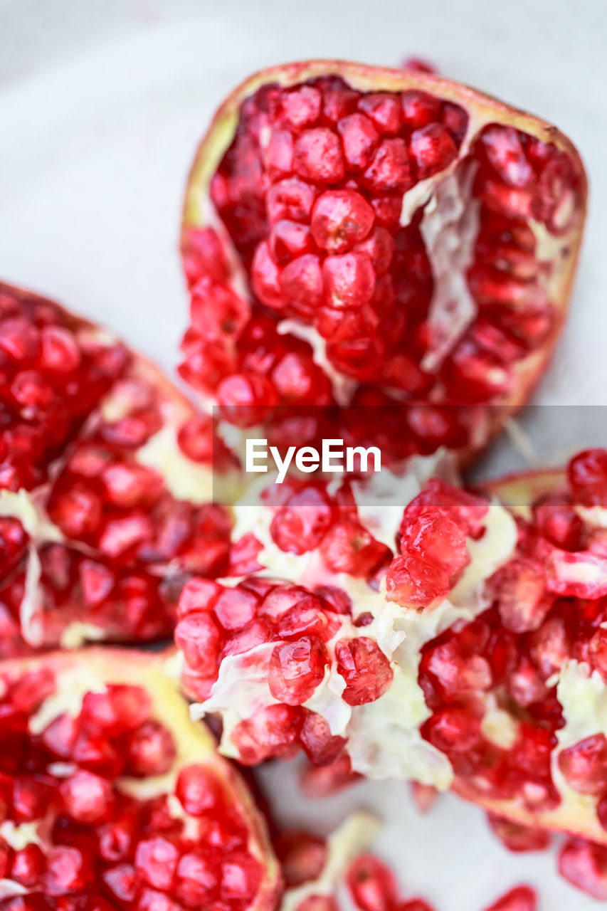 food and drink, food, healthy eating, pomegranate, fruit, red, freshness, wellbeing, plant, seed, berry, pomegranate seed, produce, close-up, raspberry, berries, no people, studio shot, antioxidant, juicy, ripe, cross section, indoors, organic