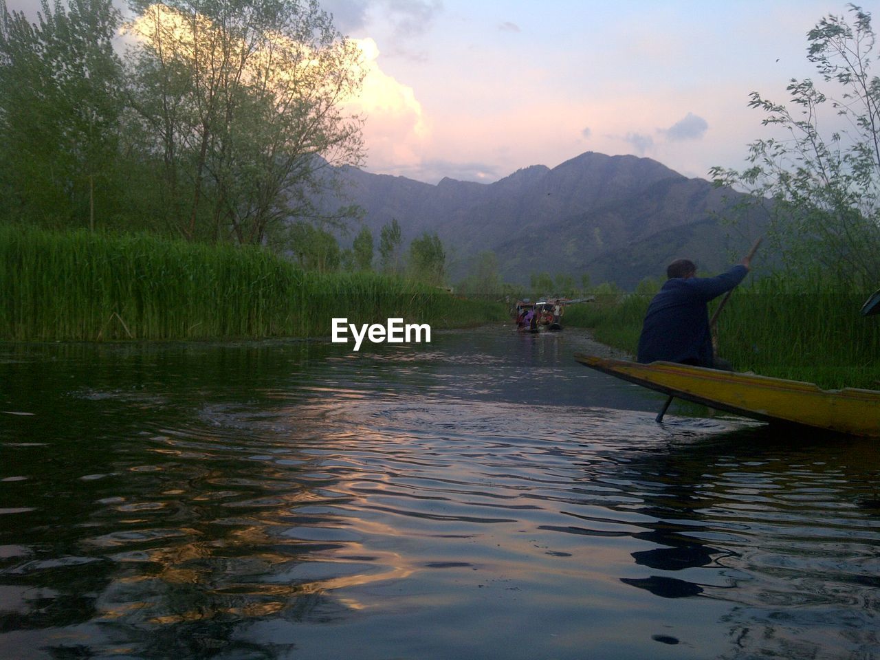 SCENIC VIEW OF LAKE BY MOUNTAINS