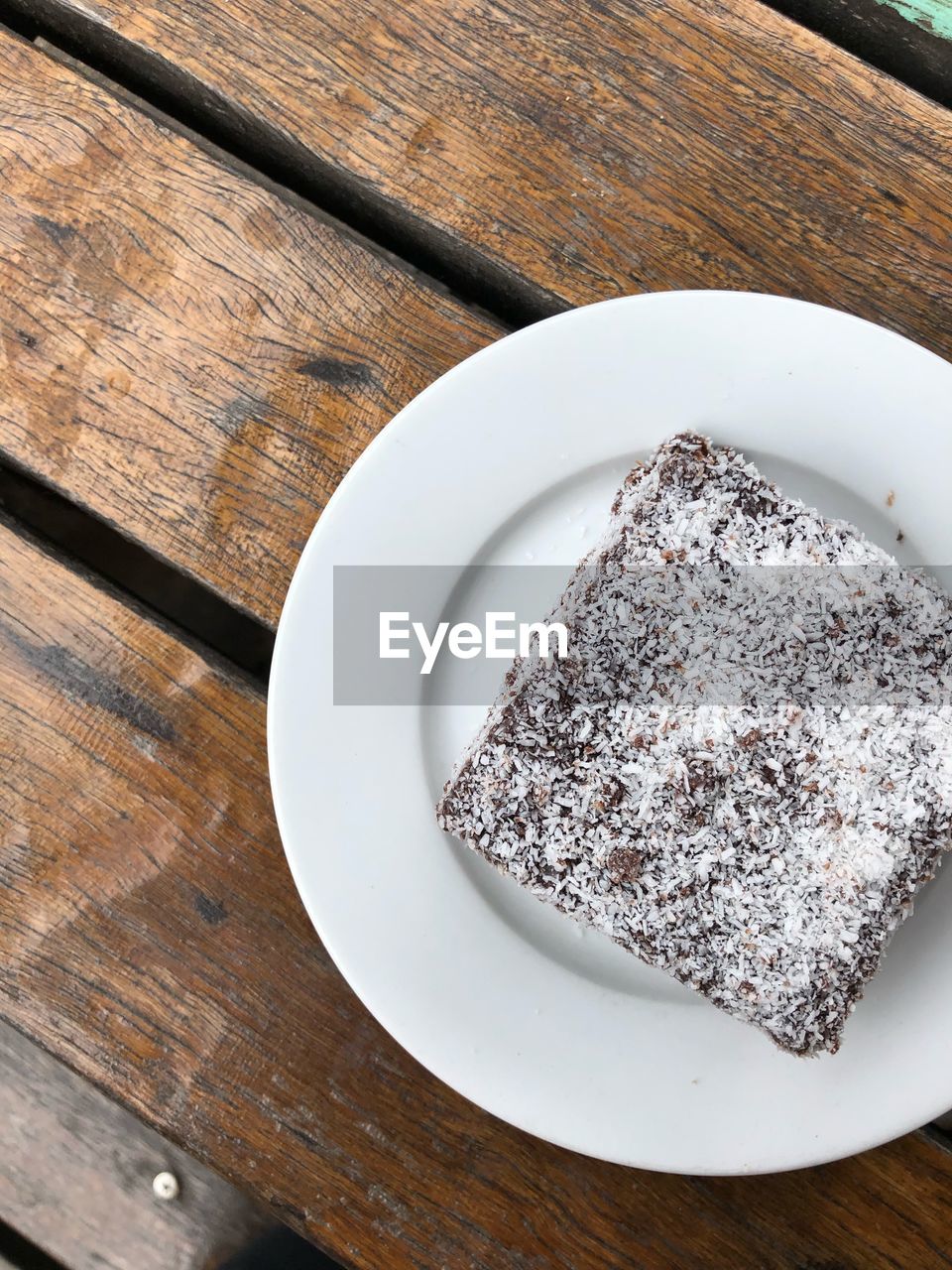 Directly above shot of cake in plate on table