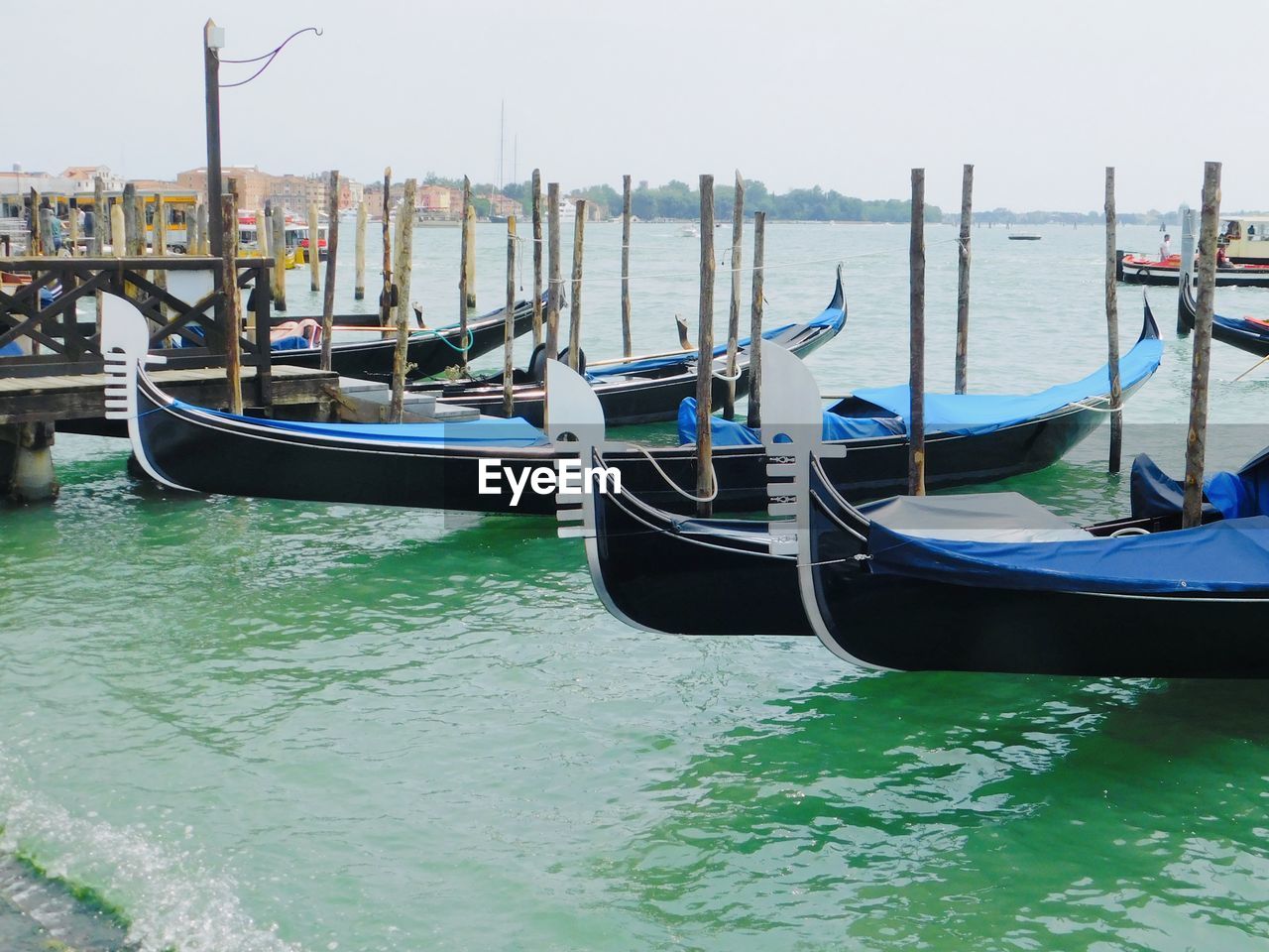 Boats moored in sea, venice