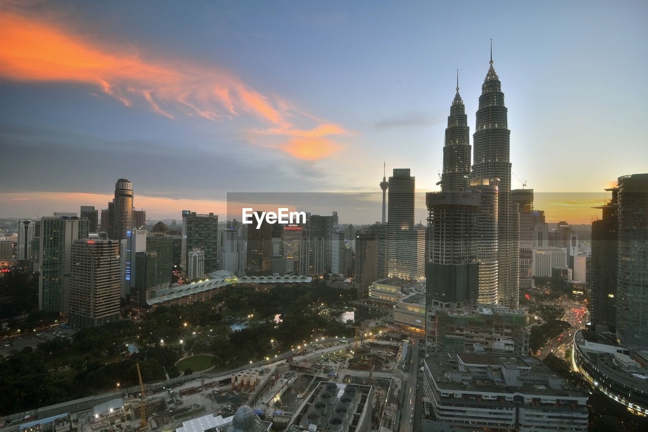 City lit up at dusk