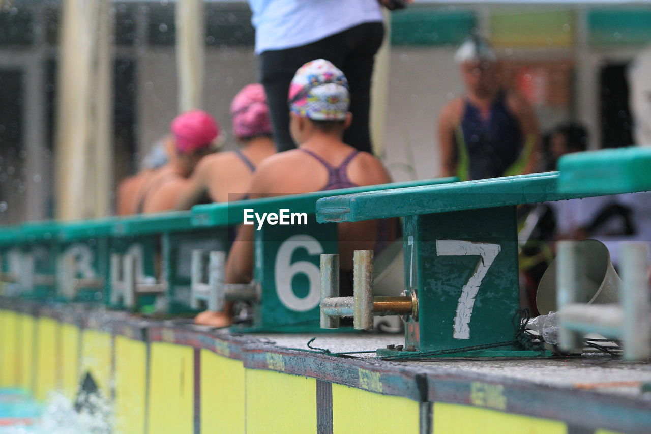 sports, endurance sports, competition, group of people, adult, day, person, recreation, clothing, men, outdoors, swimming, competitive sport, selective focus