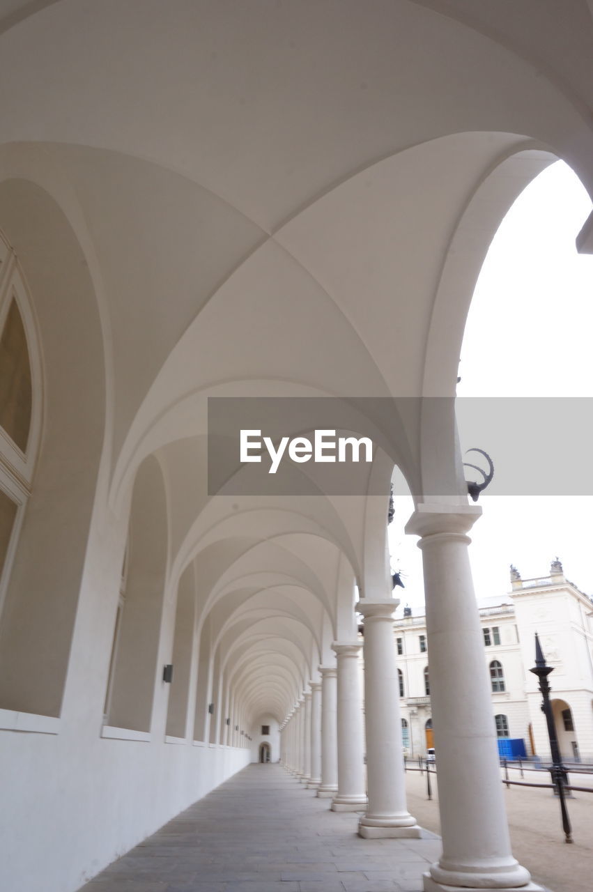 CORRIDOR OF BUILDING WITH COLONNADE