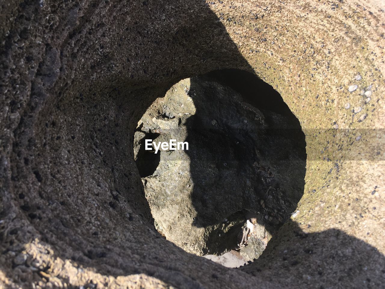 CLOSE-UP OF ROCK ON GROUND