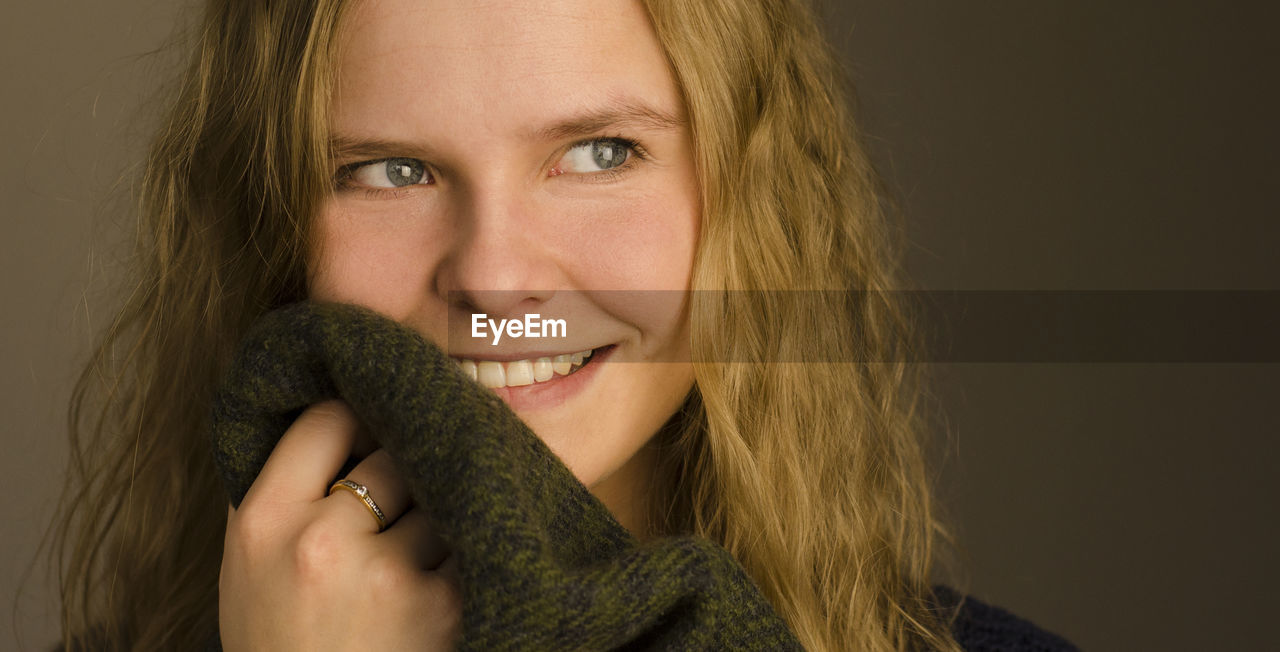 Close-up of smiling young woman