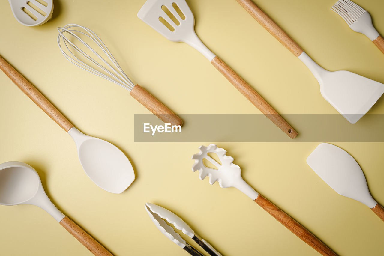 high angle view of fork and spoon and spoons on table