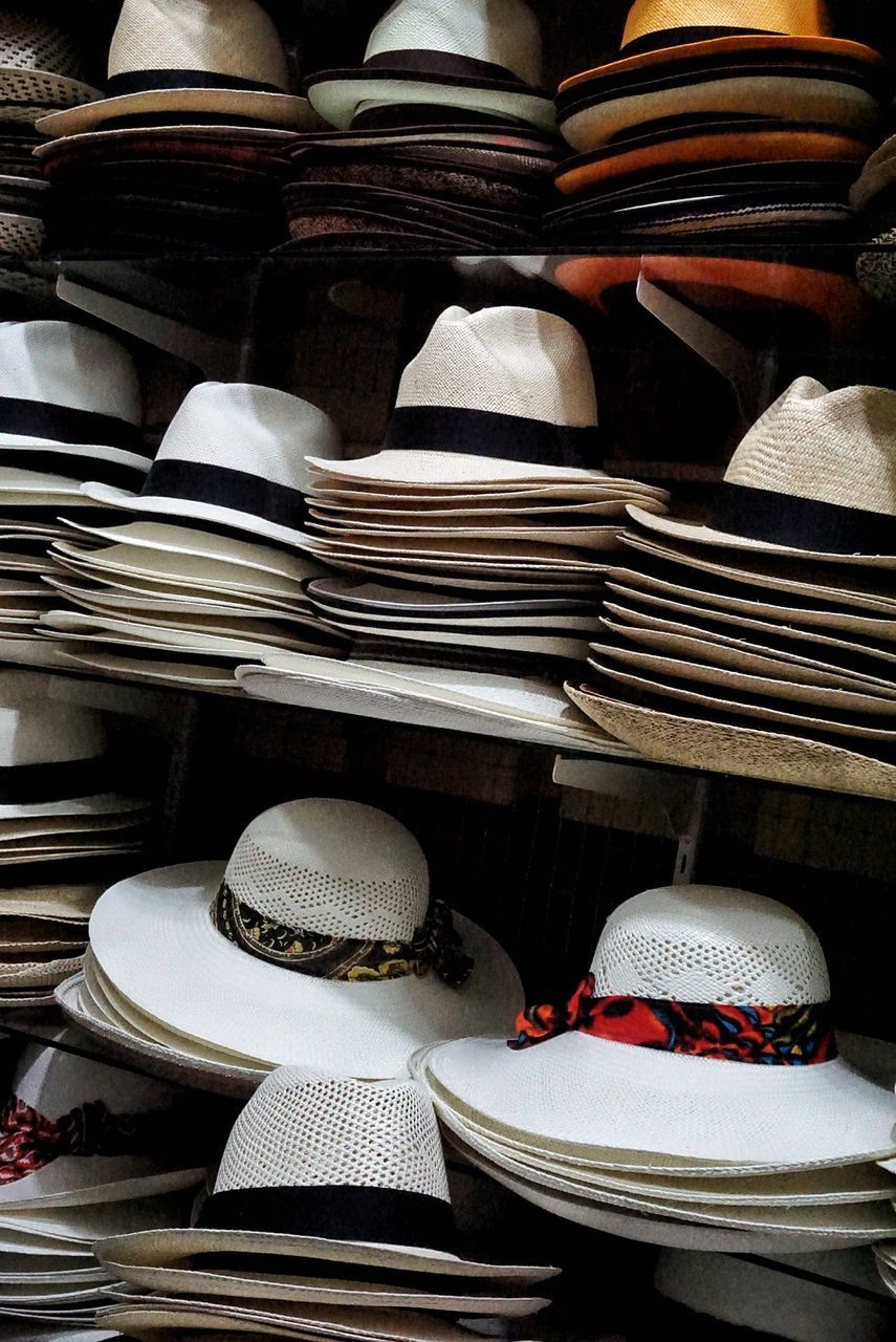 Stack of hats in row