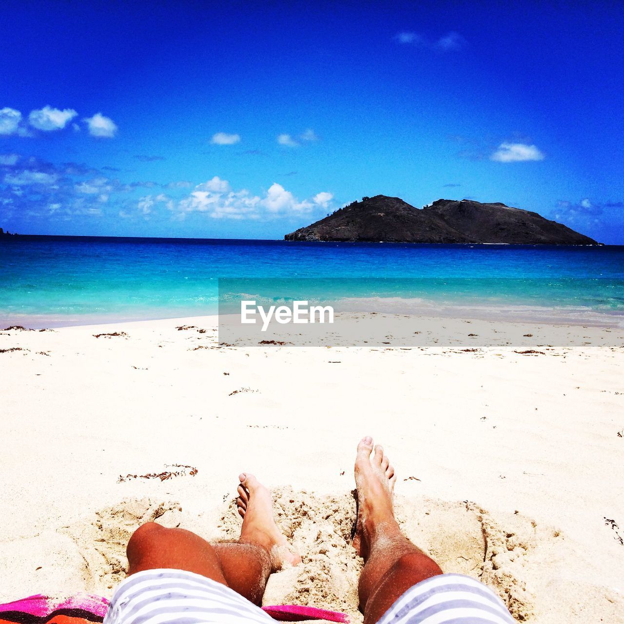 Man lying on beach