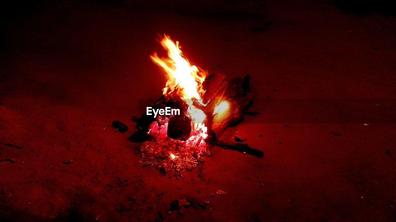 High angle view of bonfire at night