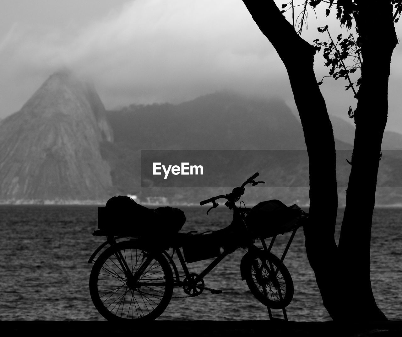 BICYCLE AGAINST MOUNTAINS