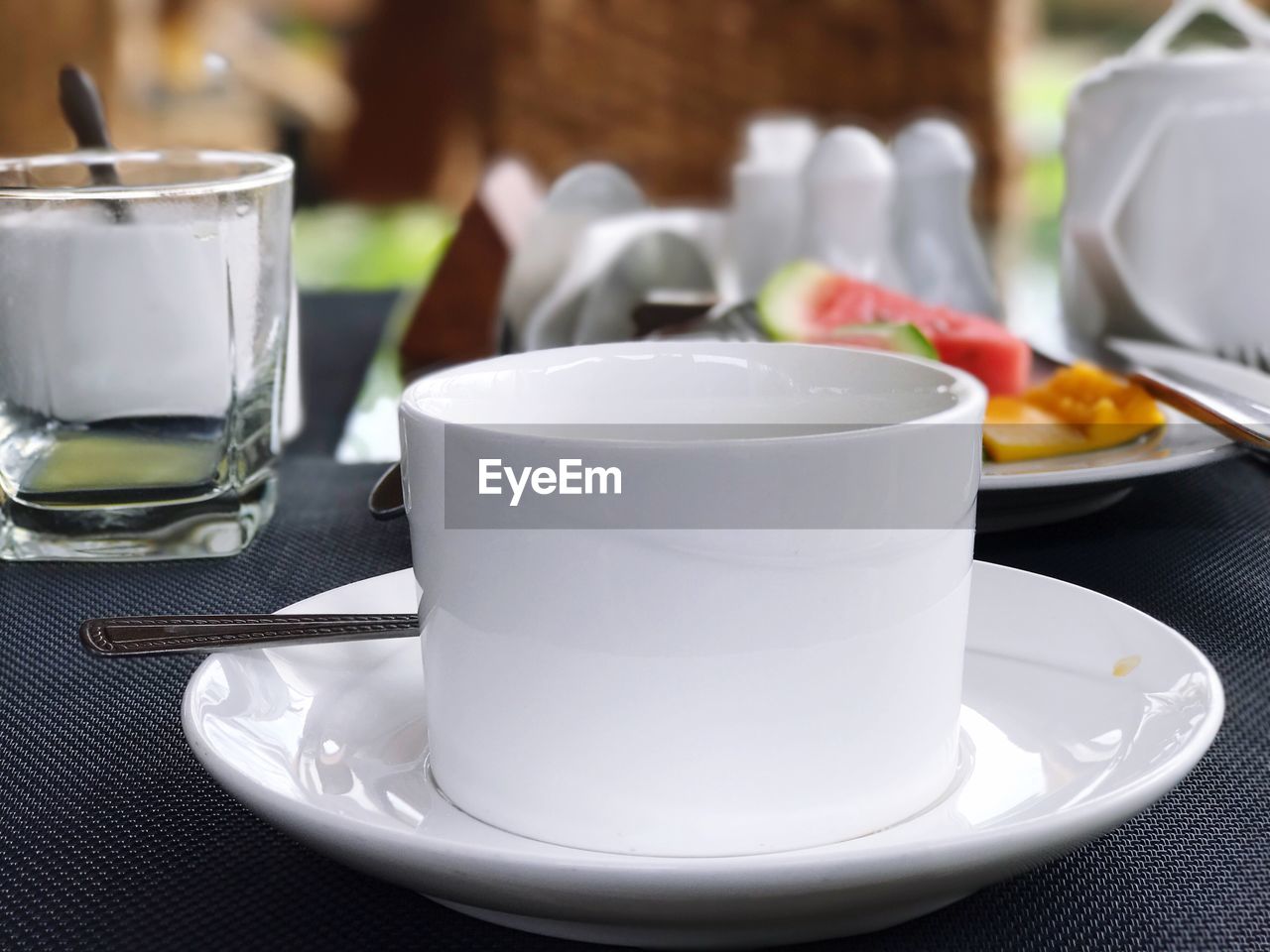 CLOSE-UP OF CUP OF TEA ON TABLE