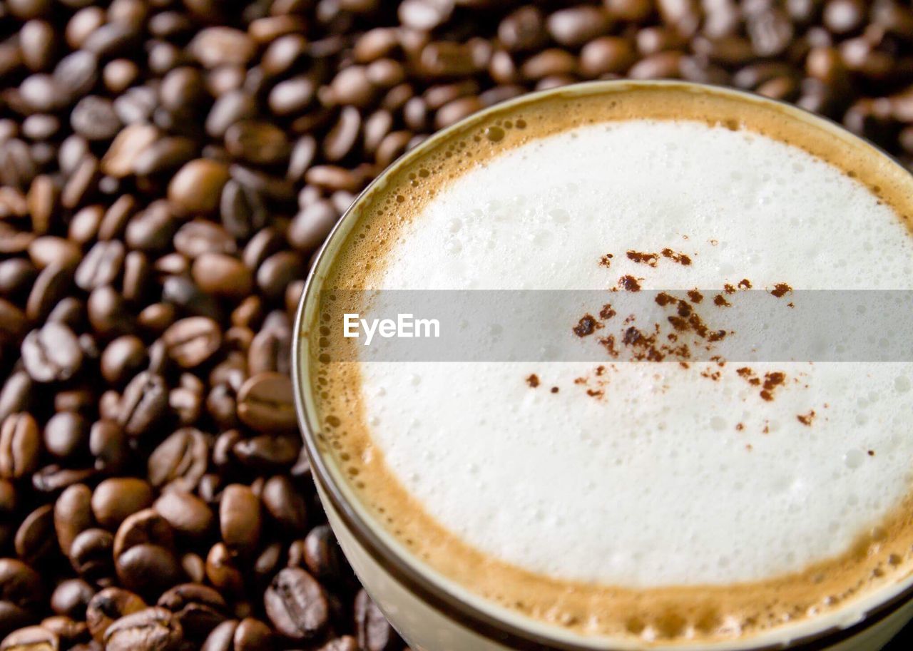 Close-up of coffee on roasted beans