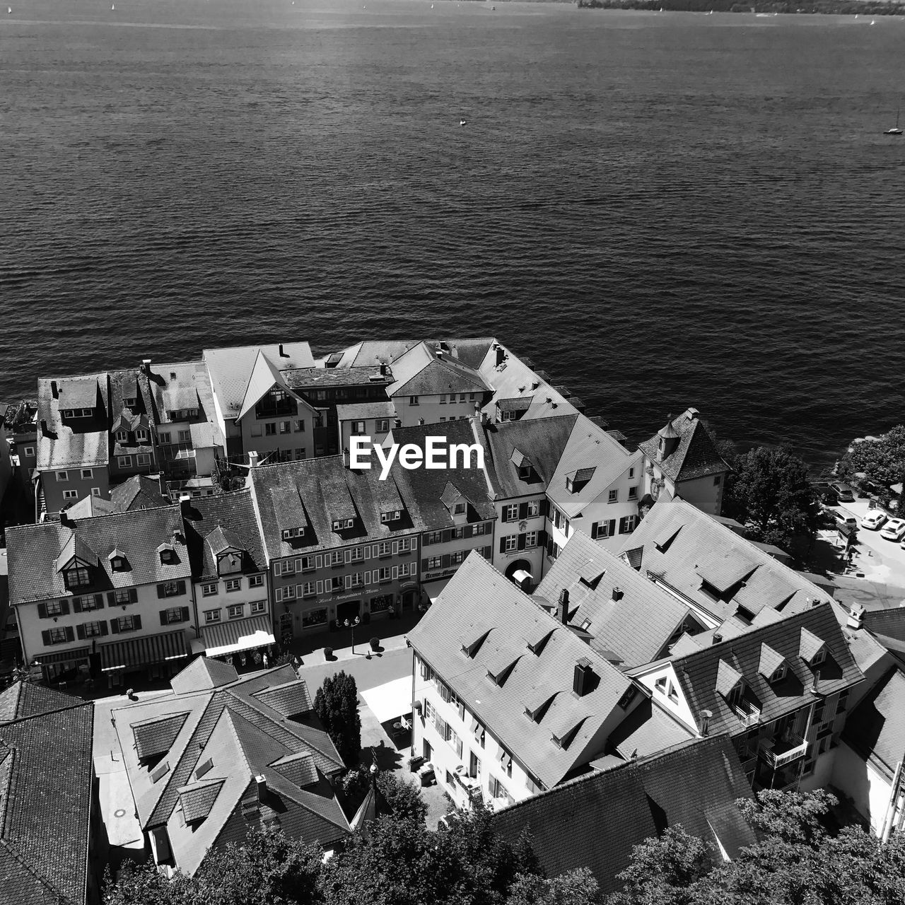 High angle view of buildings by sea