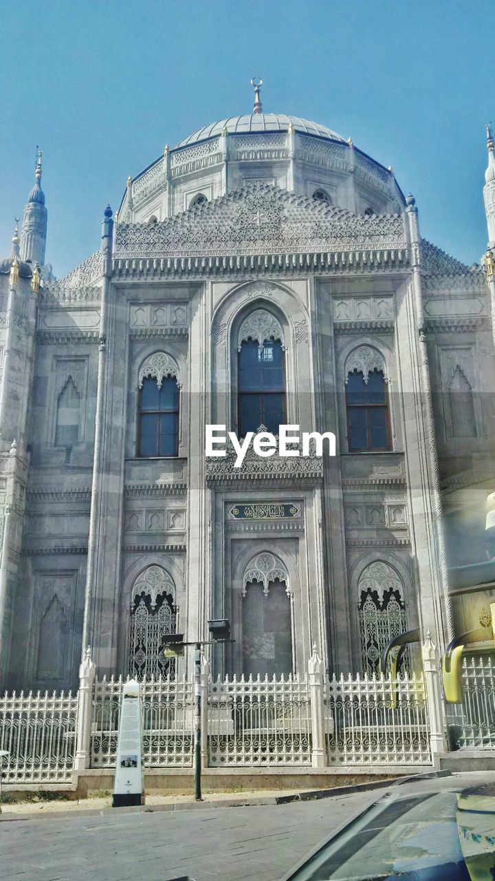 EXTERIOR OF CATHEDRAL AGAINST SKY