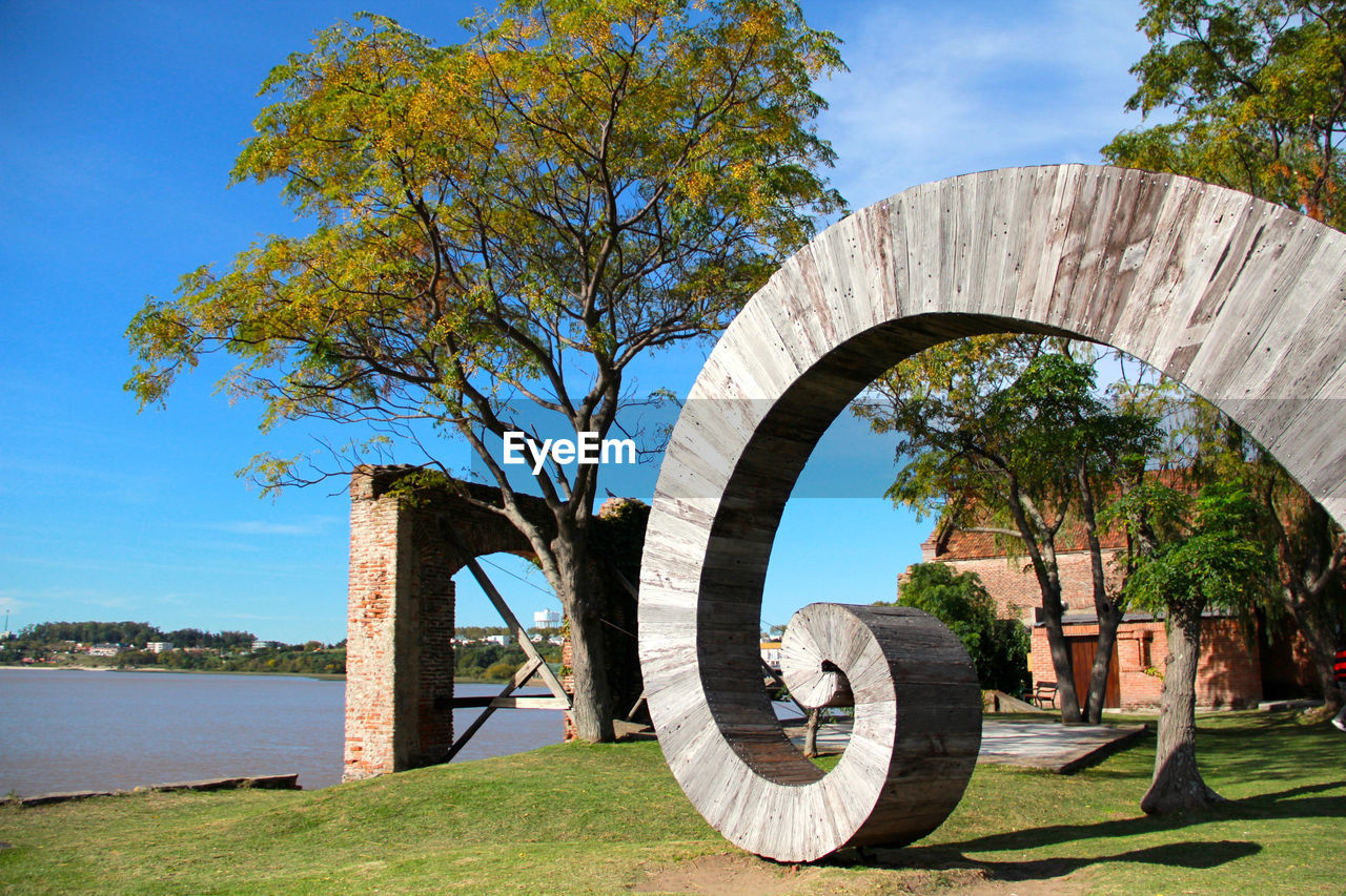 Curved structure at park by river