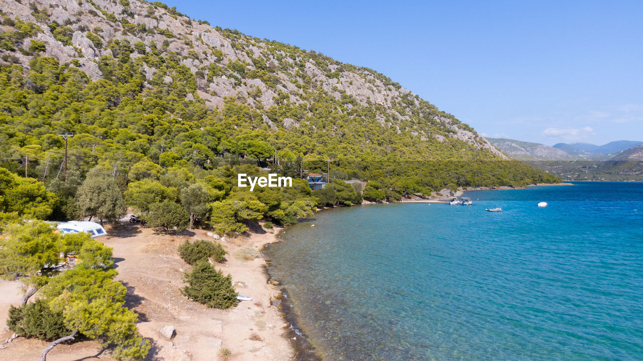 SCENIC VIEW OF SEA AGAINST BLUE SKY