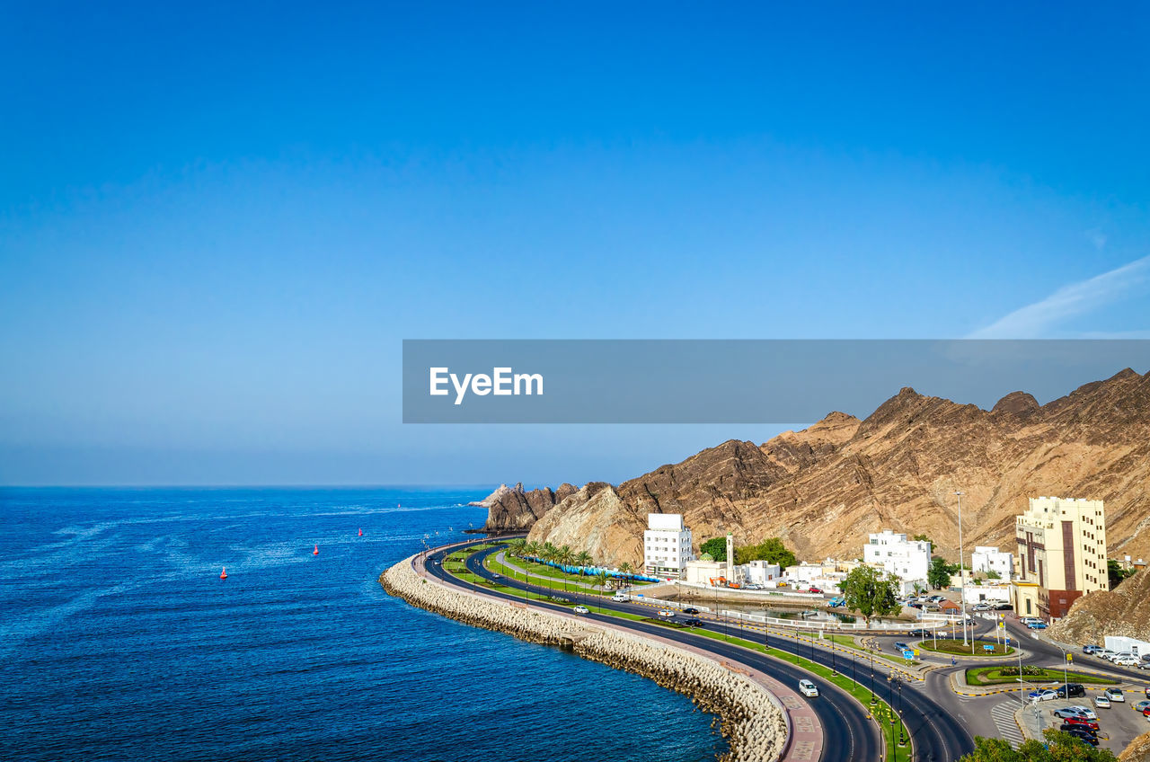 PANORAMIC SHOT OF SEA AGAINST CLEAR BLUE SKY