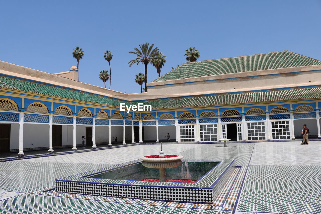 VIEW OF SWIMMING POOL BUILDING AGAINST SKY