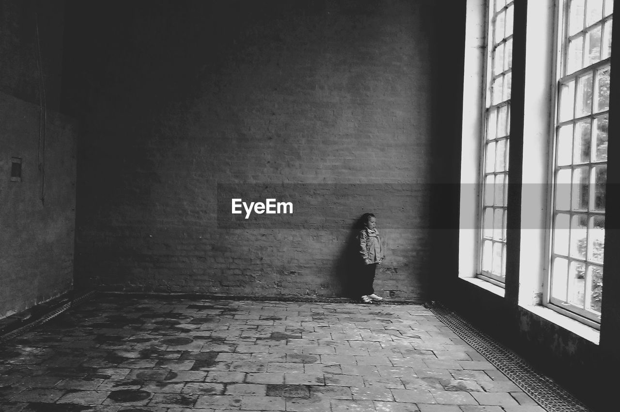 View of girl in empty room