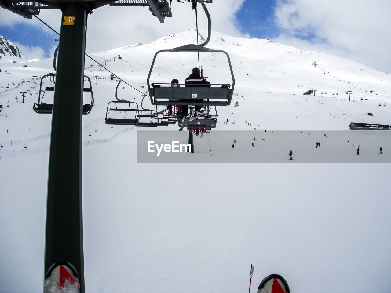 Overhead cable car against sky during winter