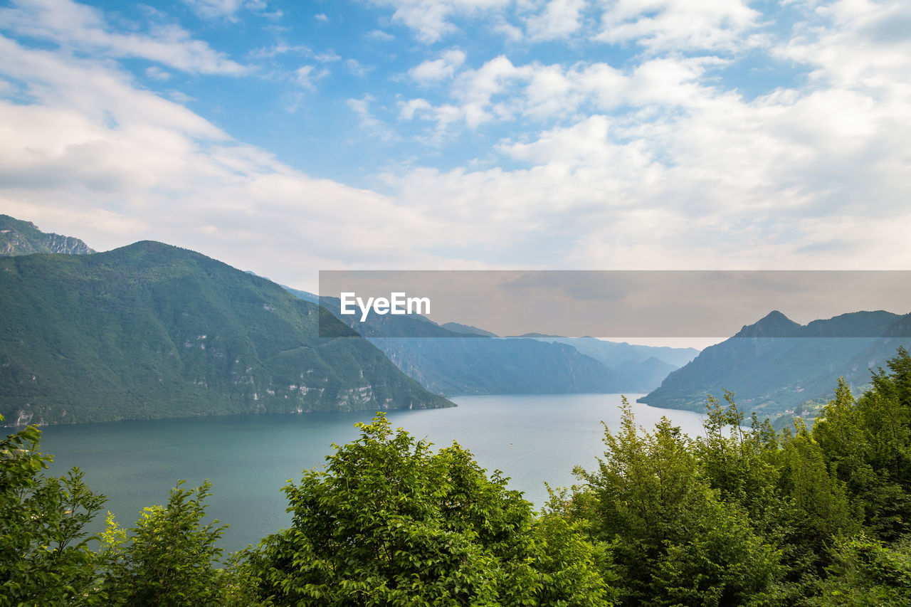 View over the village of anfo at lake idro, lombardy, italy at sunny summer day. 