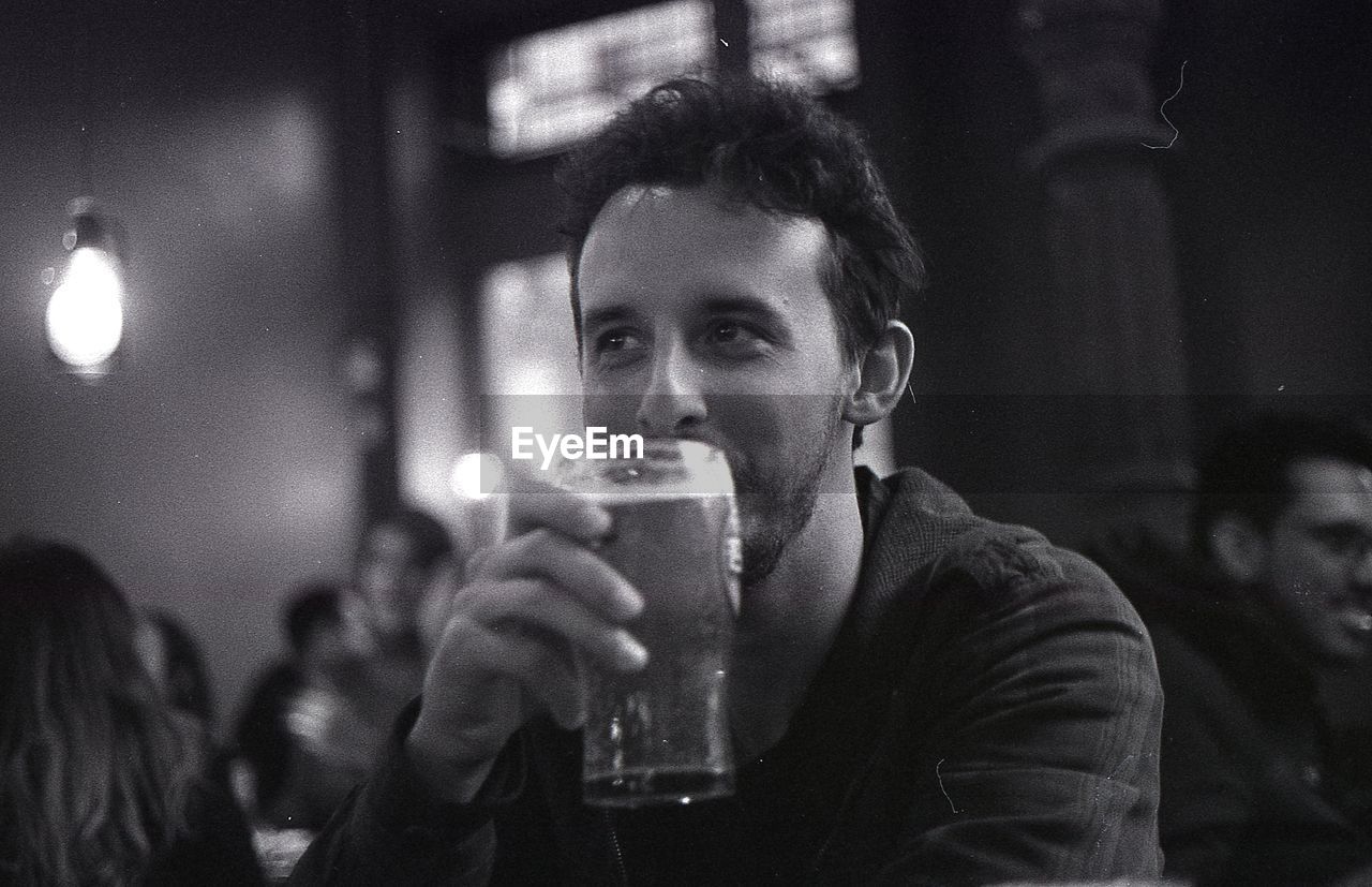 Man drinking beer in restaurant