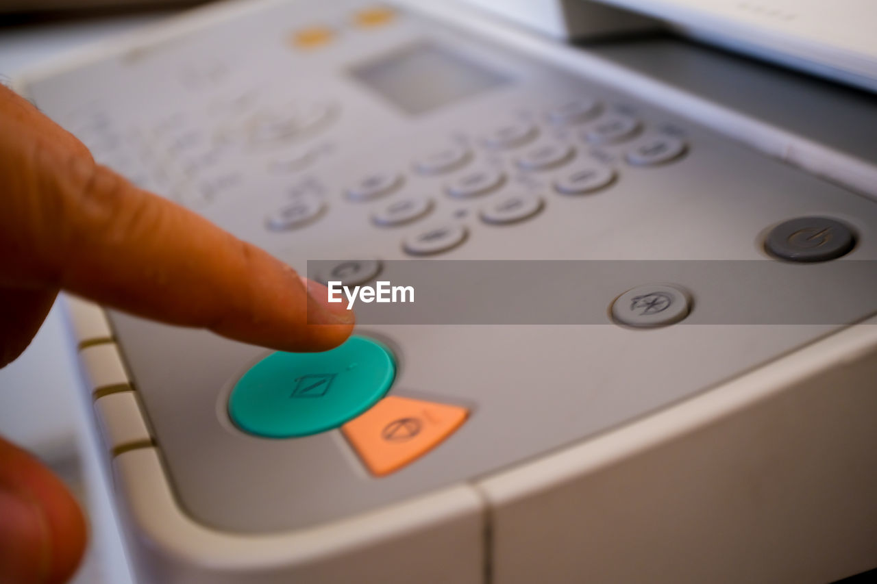 cropped hand using sound recording equipment