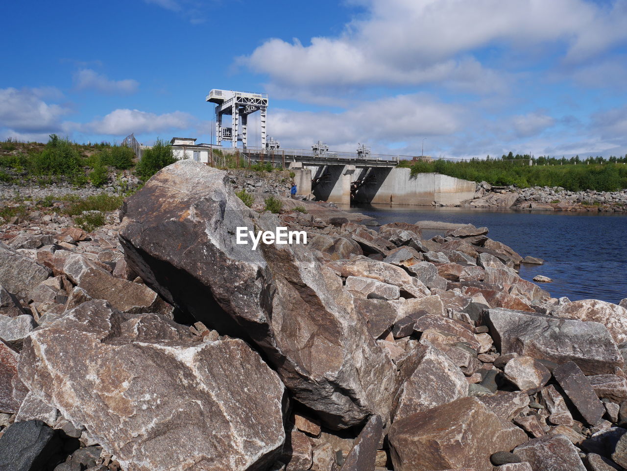 Scenic view of shore against sky