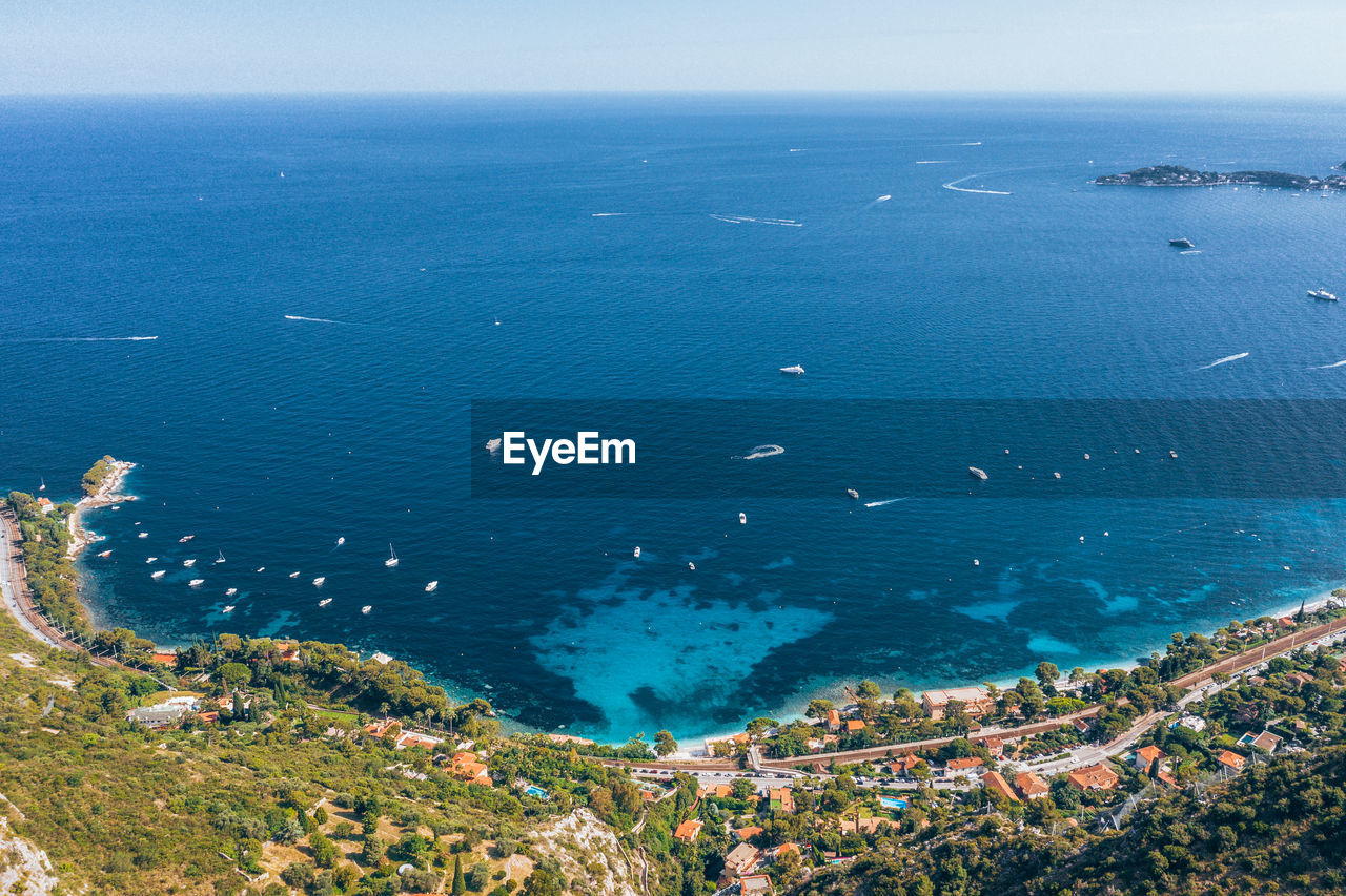 High angle view of sea shore against sky