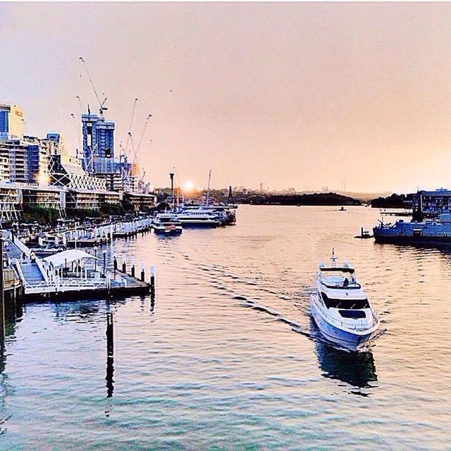 BOATS MOORED IN HARBOR