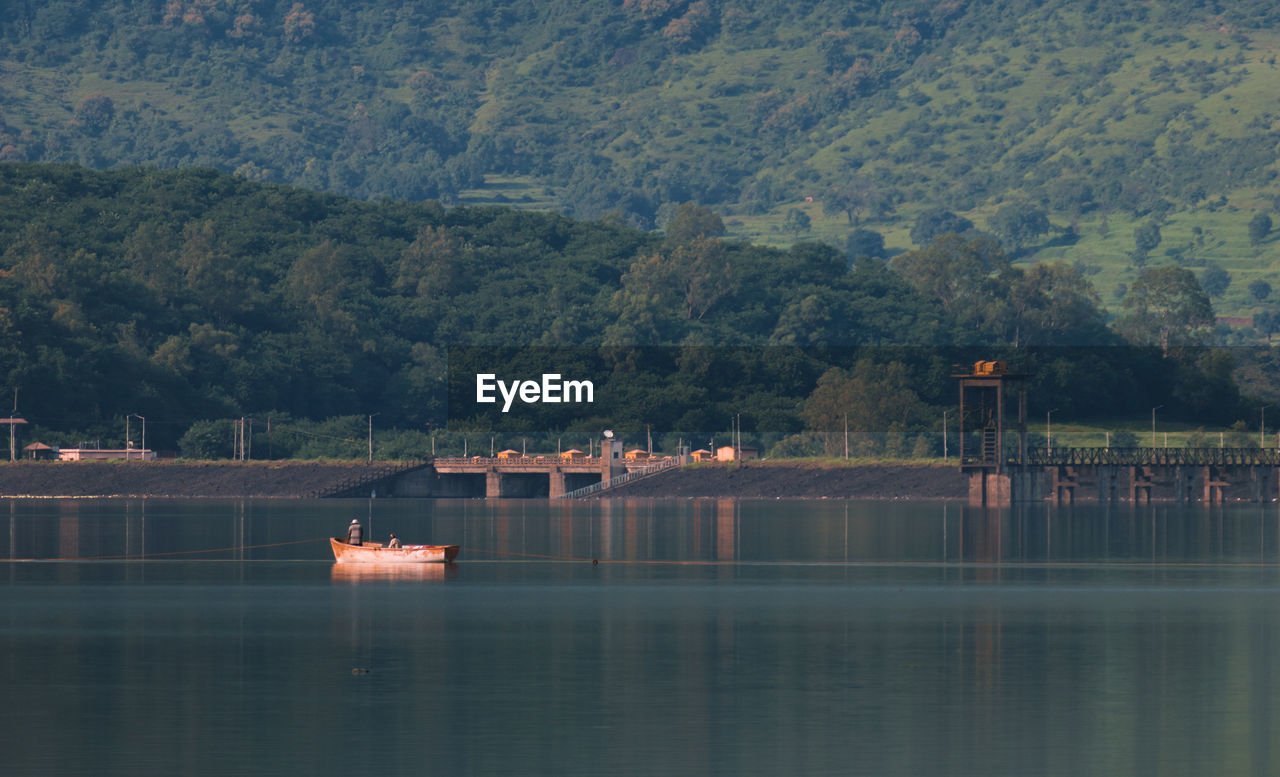 Scenic view of lake against mountain