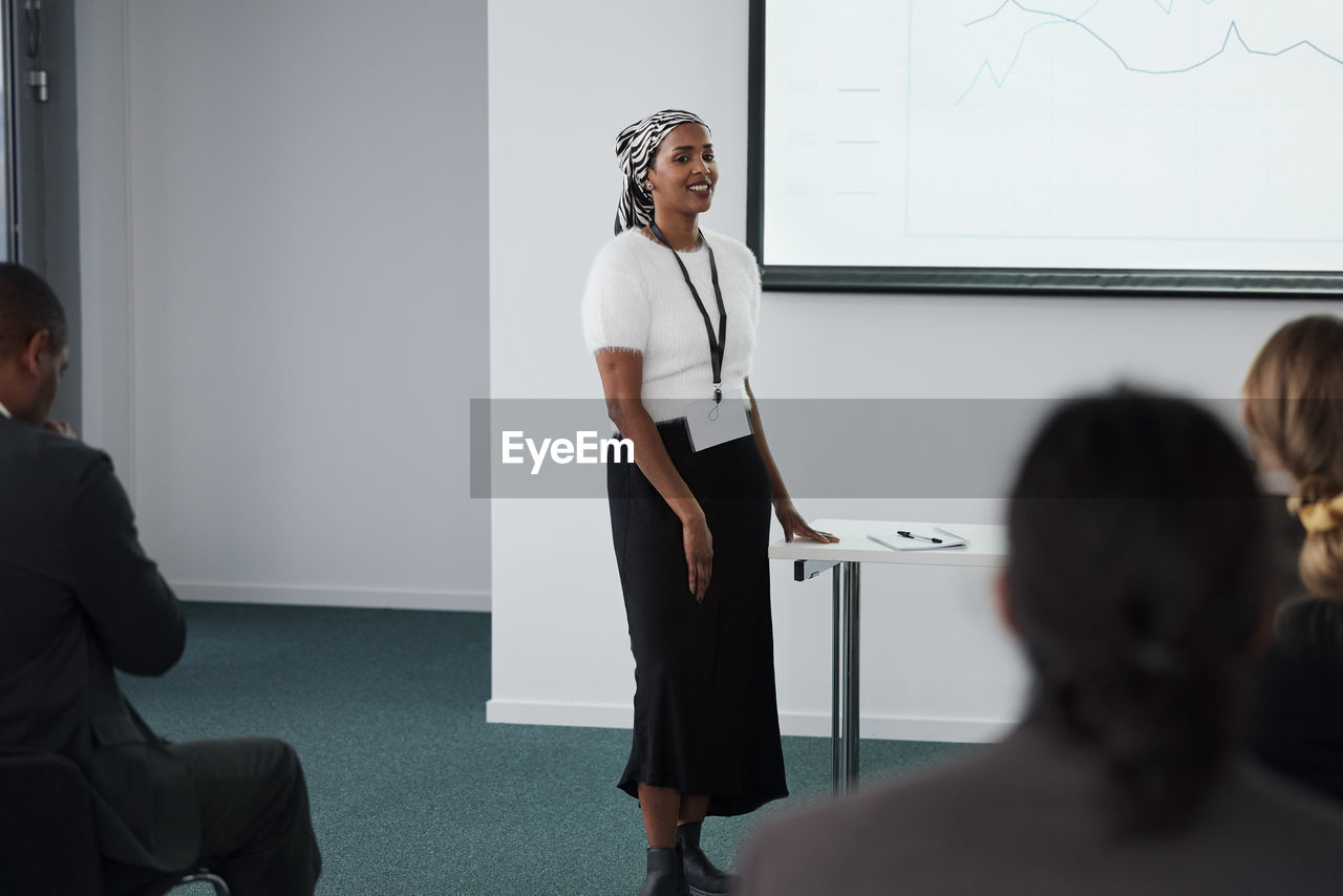 Woman having presentation during business meeting