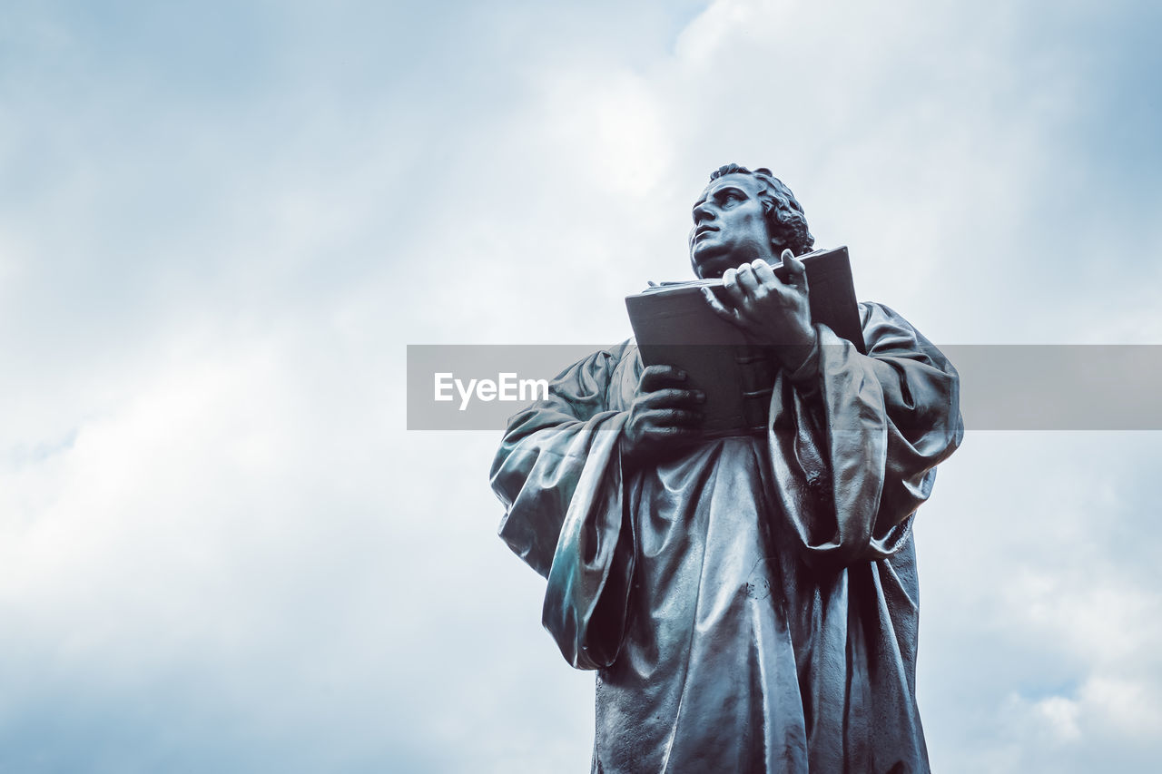 LOW ANGLE VIEW OF STATUE