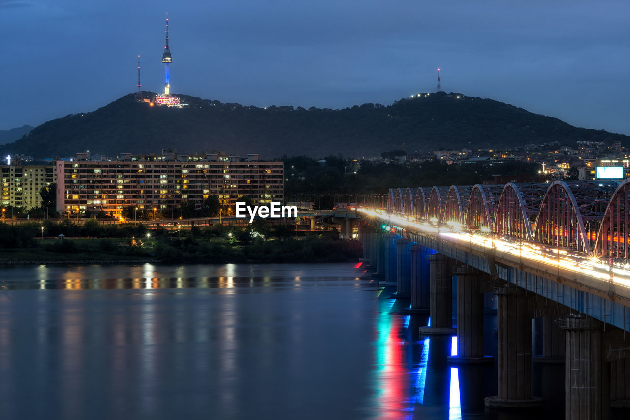 Illuminated buildings in city at night