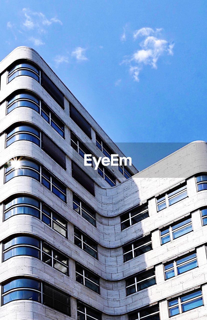 Low angle view of modern building against sky