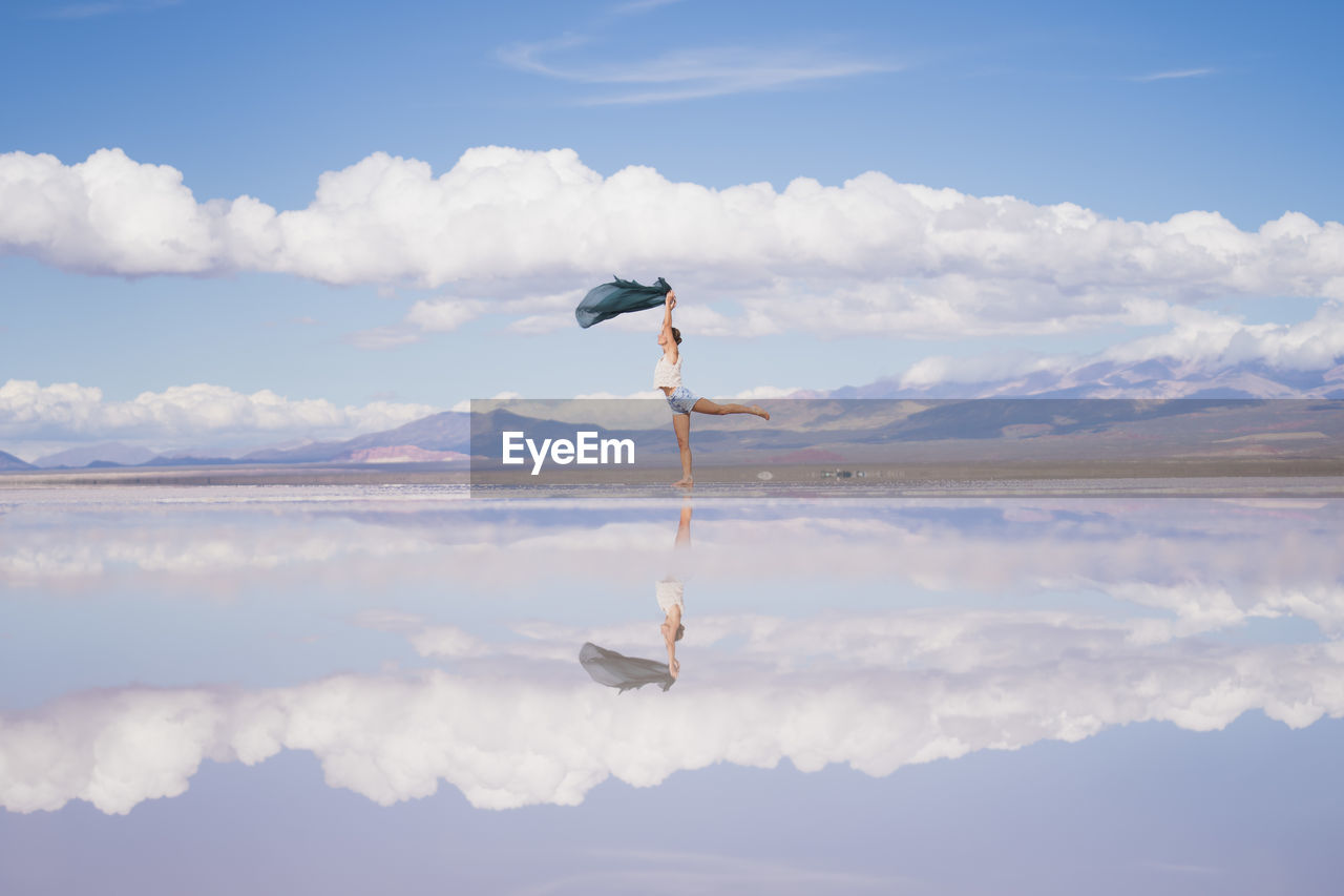 Dancing girl in the salt flat