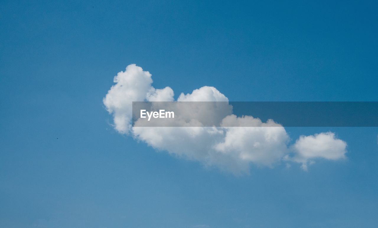 Low angle view of clouds in blue sky